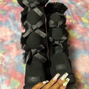 UGG Black Women's Winter Boots with Ribbon Detail. In good condition but used